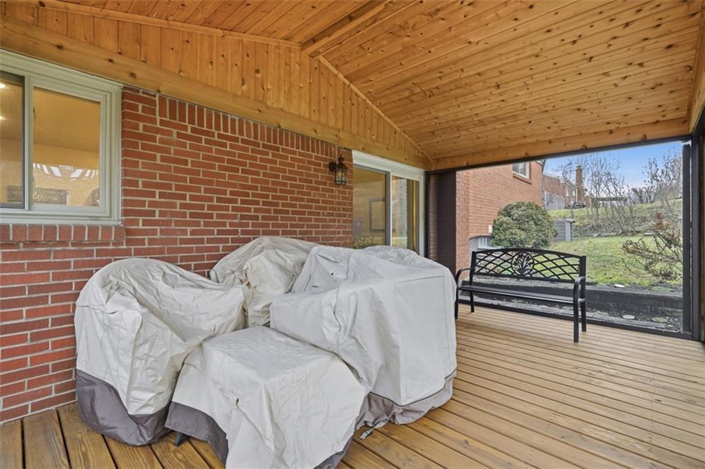5301 Ranchview Drive Pittsburgh, PA 15236 - Photo 16 of 44 a view of a patio with a table and chairs