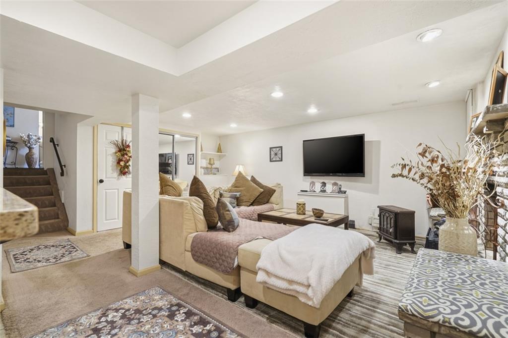5301 Ranchview Drive Pittsburgh, PA 15236 - Photo 22 of 44 a living room with furniture and a flat screen tv