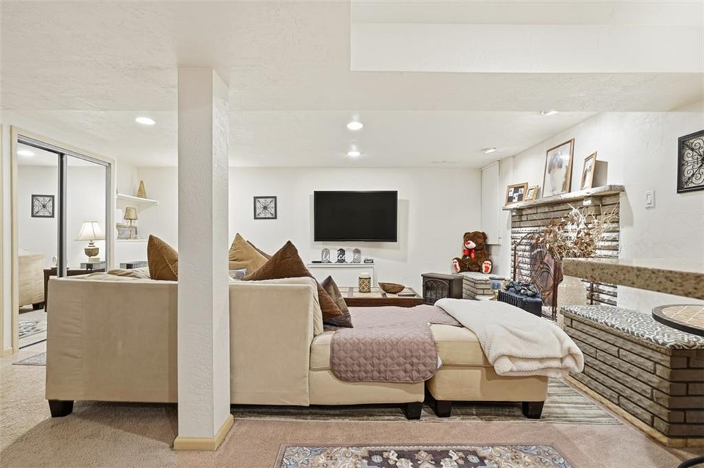 5301 Ranchview Drive Pittsburgh, PA 15236 - Photo 23 of 44 a living room with furniture and a flat screen tv