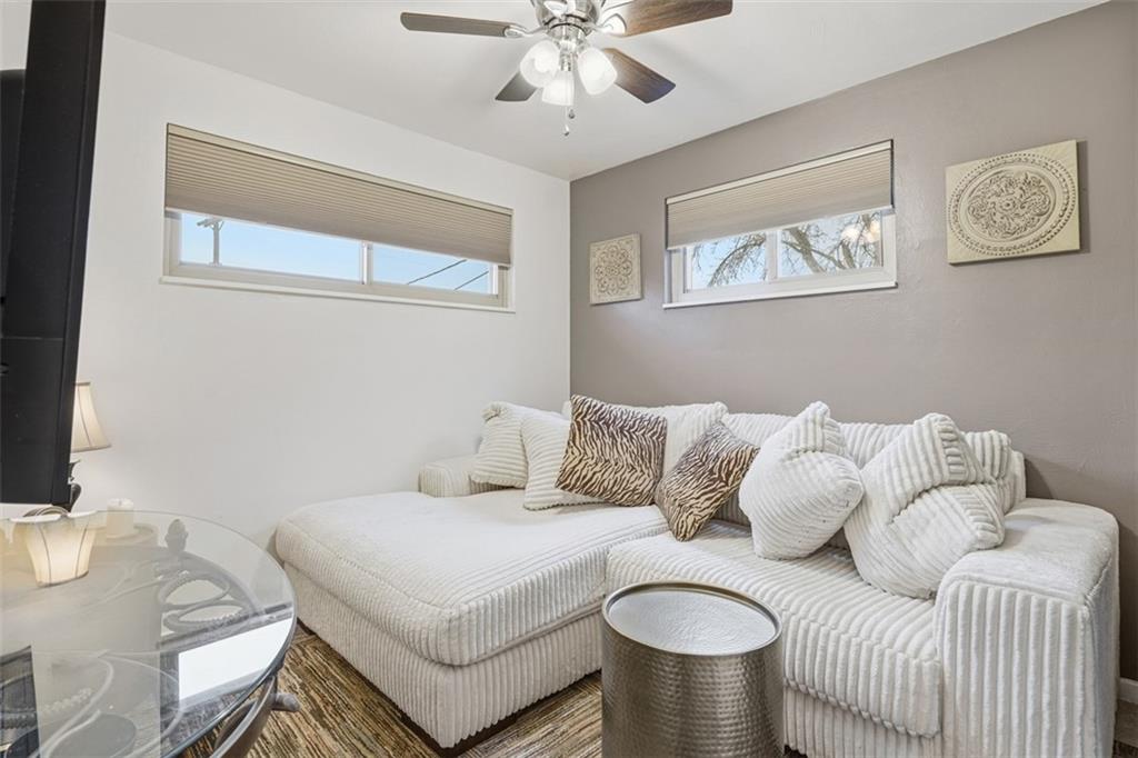 5301 Ranchview Drive Pittsburgh, PA 15236 - Photo 34 of 44 a living room with furniture and a chandelier