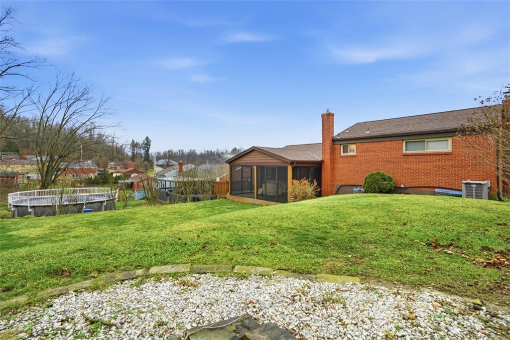 5301 Ranchview Drive Pittsburgh, PA 15236 - Photo 36 of 44 a front view of a house with a yard