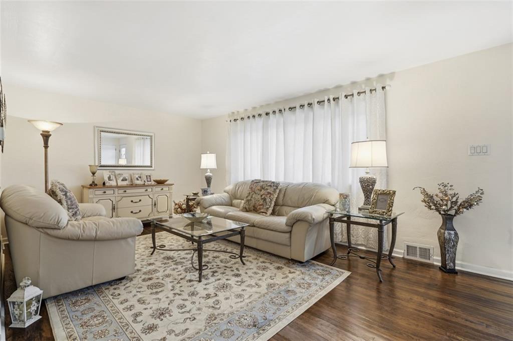 5301 Ranchview Drive Pittsburgh, PA 15236 - Photo 8 of 44 a living room with furniture and a large window