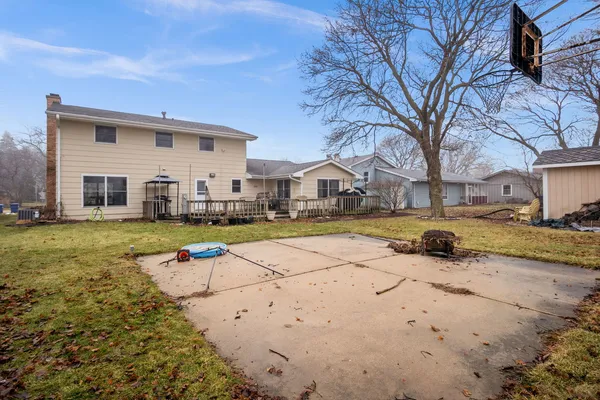 a view of the patio with a yard