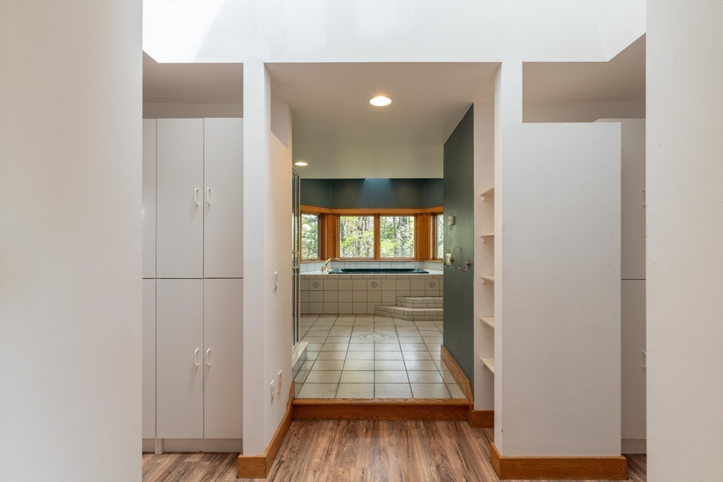 184 W Road Bernardston, MA 01337 - Photo 24 of 41 a view of hallway with wooden floor and cabinet