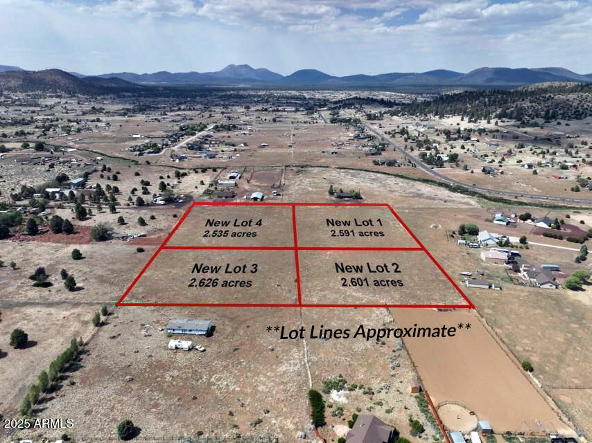 8000-8004 East Rope Road Flagstaff, AZ 86004 - Photo 6 of 15 with sign on the side of the road