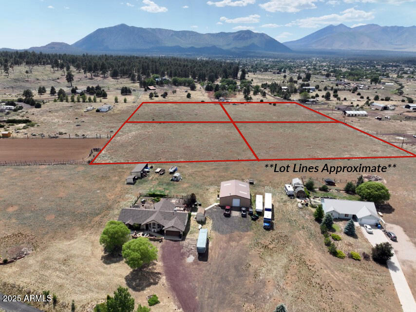 8000-8004 East Rope Road Flagstaff, AZ 86004 - Photo 8 of 15 a view of multiple houses with a road
