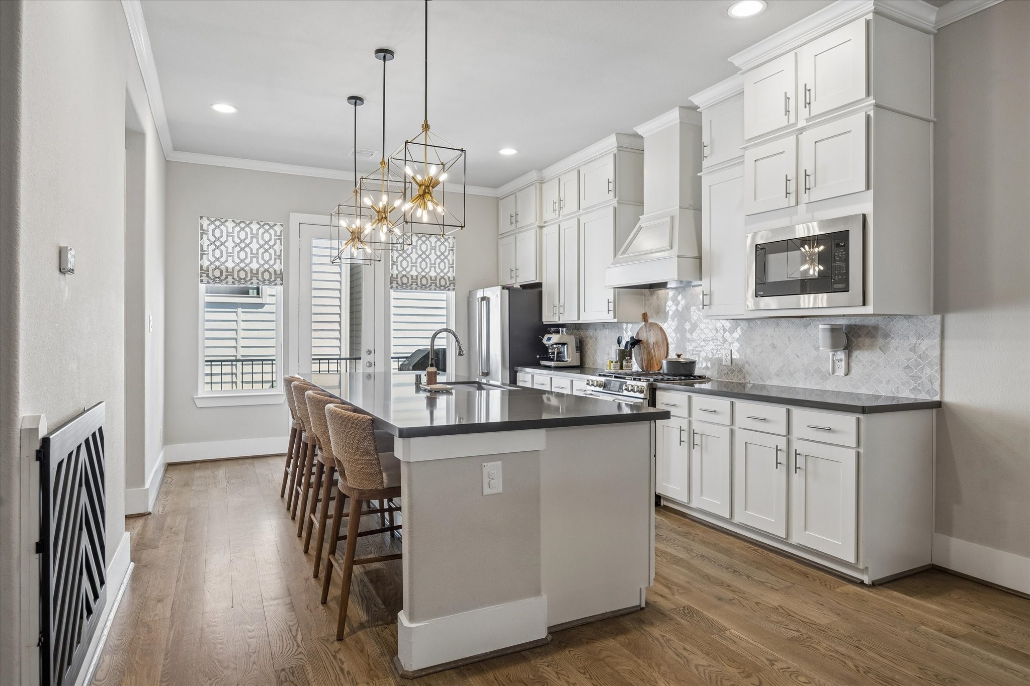 1309 West 24th Street, Unit B Houston, TX 77008 - Photo 10 of 22 Chefs dream kitchen with an abundance of cabinetry for storage.