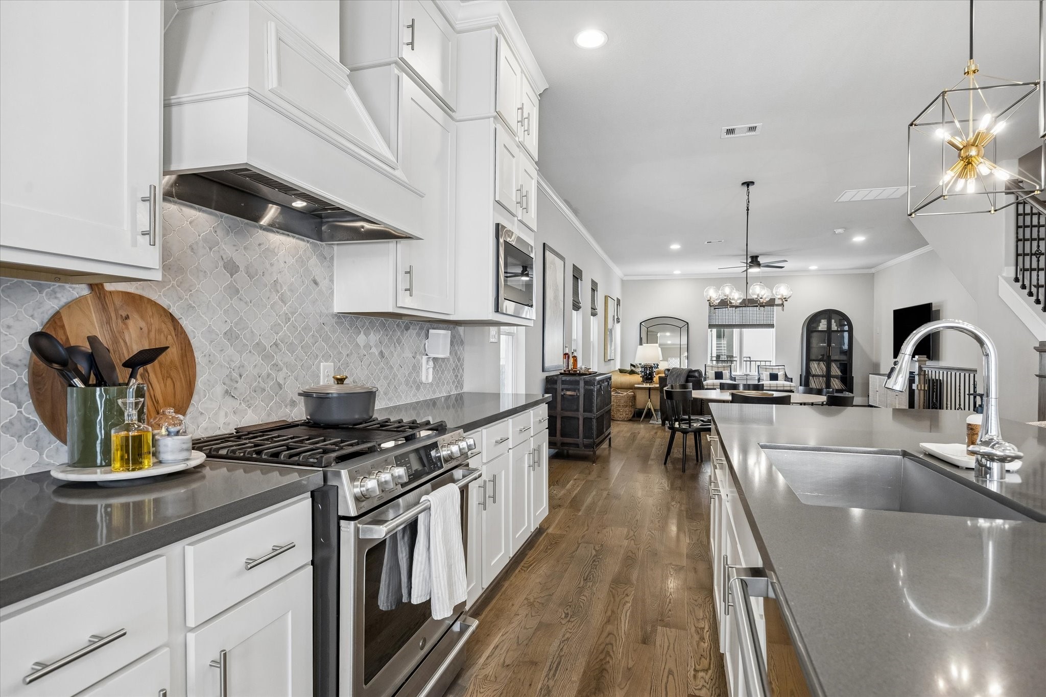 1309 West 24th Street, Unit B Houston, TX 77008 - Photo 13 of 22 Another view of the kitchen looking out to the spacious dining and living areas.