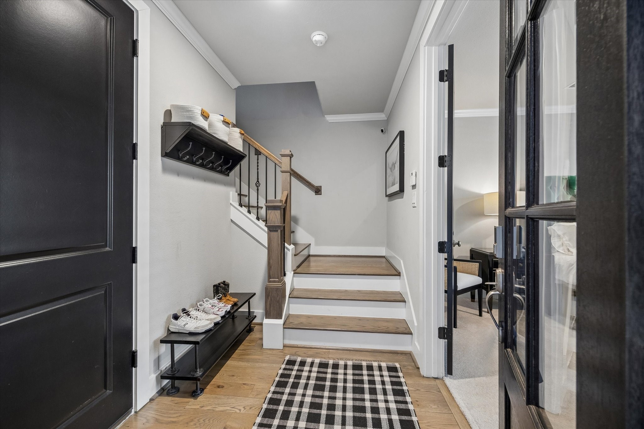 1309 West 24th Street, Unit B Houston, TX 77008 - Photo 4 of 22 Lovely entryway. As you'll see as you tour, this home has been so well maintained. The owners have added a great deal of additional storage racks in the garage that will stay with the home.