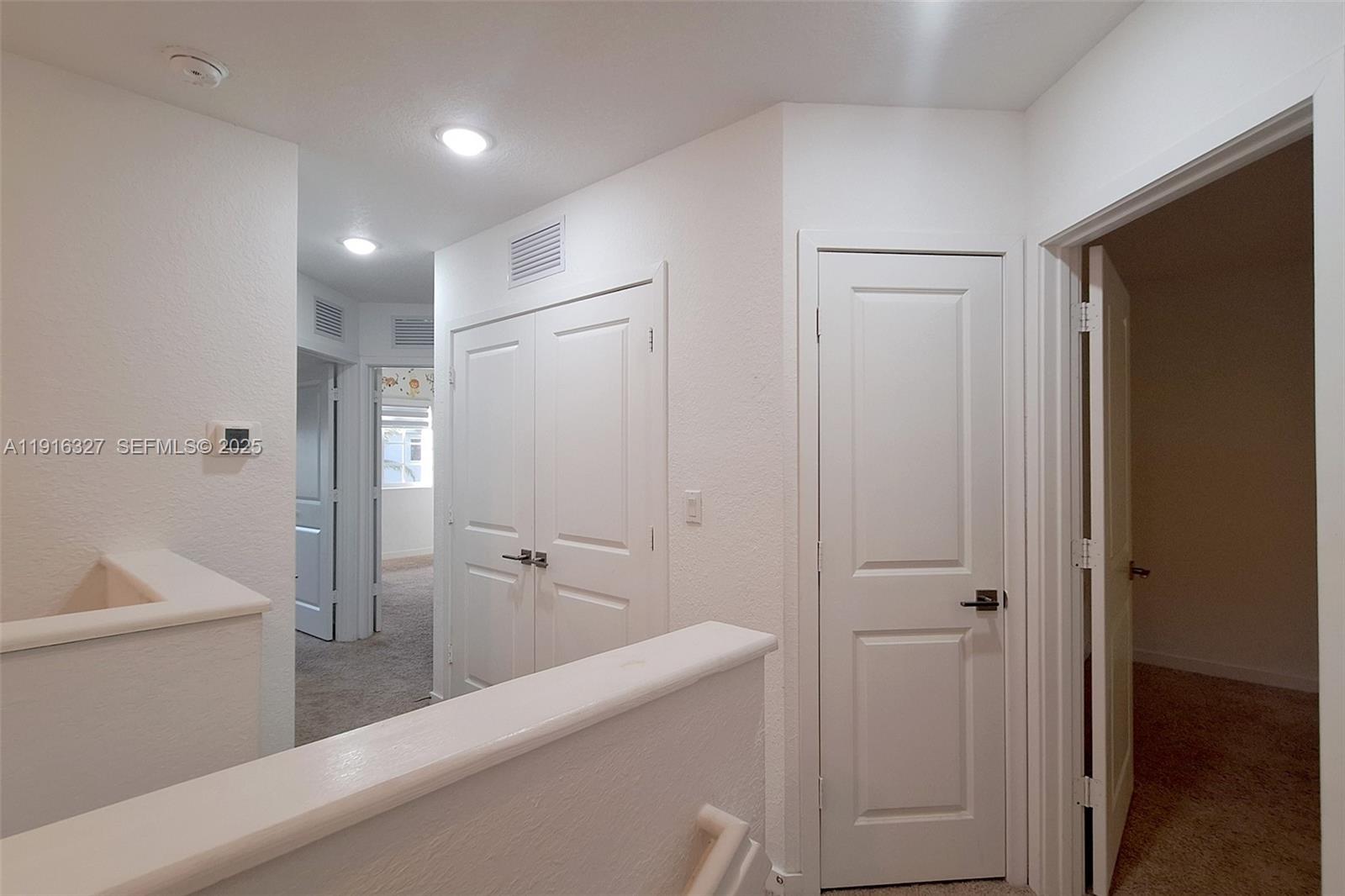 1325 Northwest 208th Street Miami Gardens, FL 33169 - Photo 12 of 38 a bathroom with a sink and a large mirror