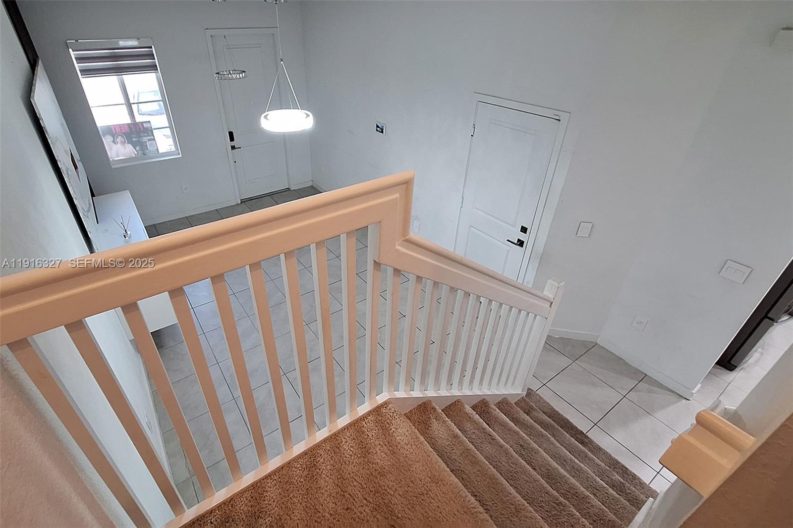 1325 Northwest 208th Street Miami Gardens, FL 33169 - Photo 13 of 38 a view of a hallway view with staircase