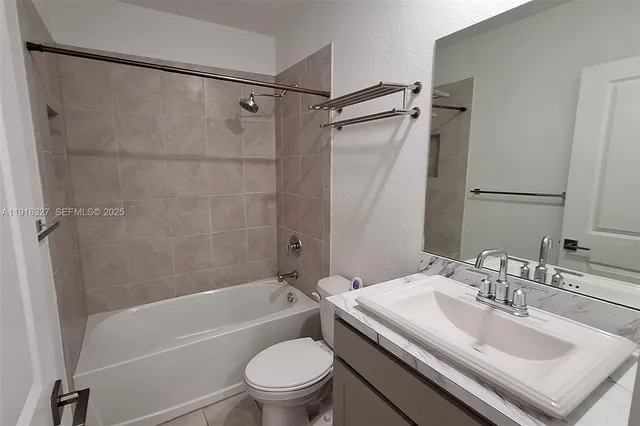 an empty room with a bathroom