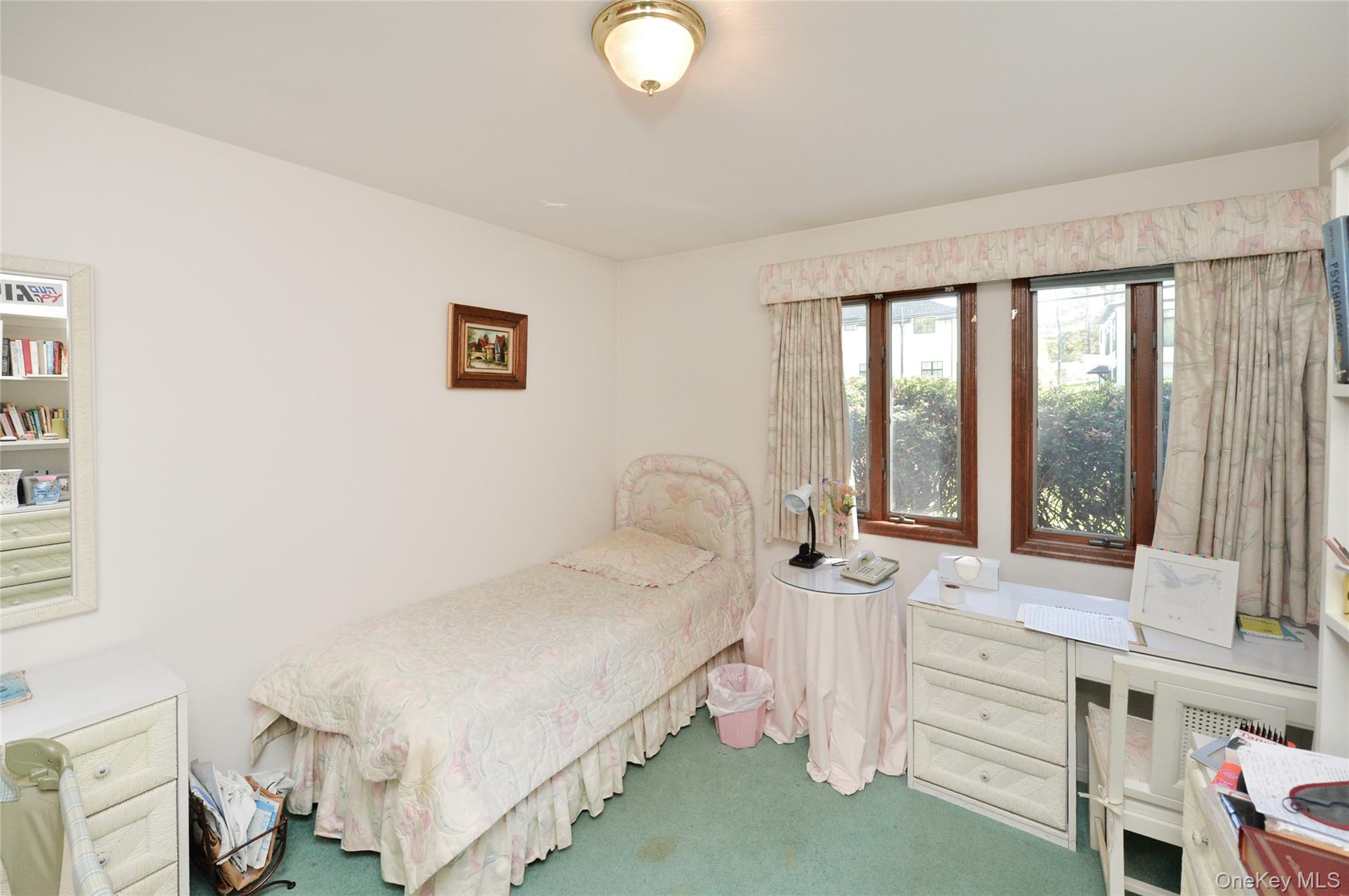 24 Highview Road Monsey, NY 10952 - Photo 22 of 44 a bedroom with a bed and a large window