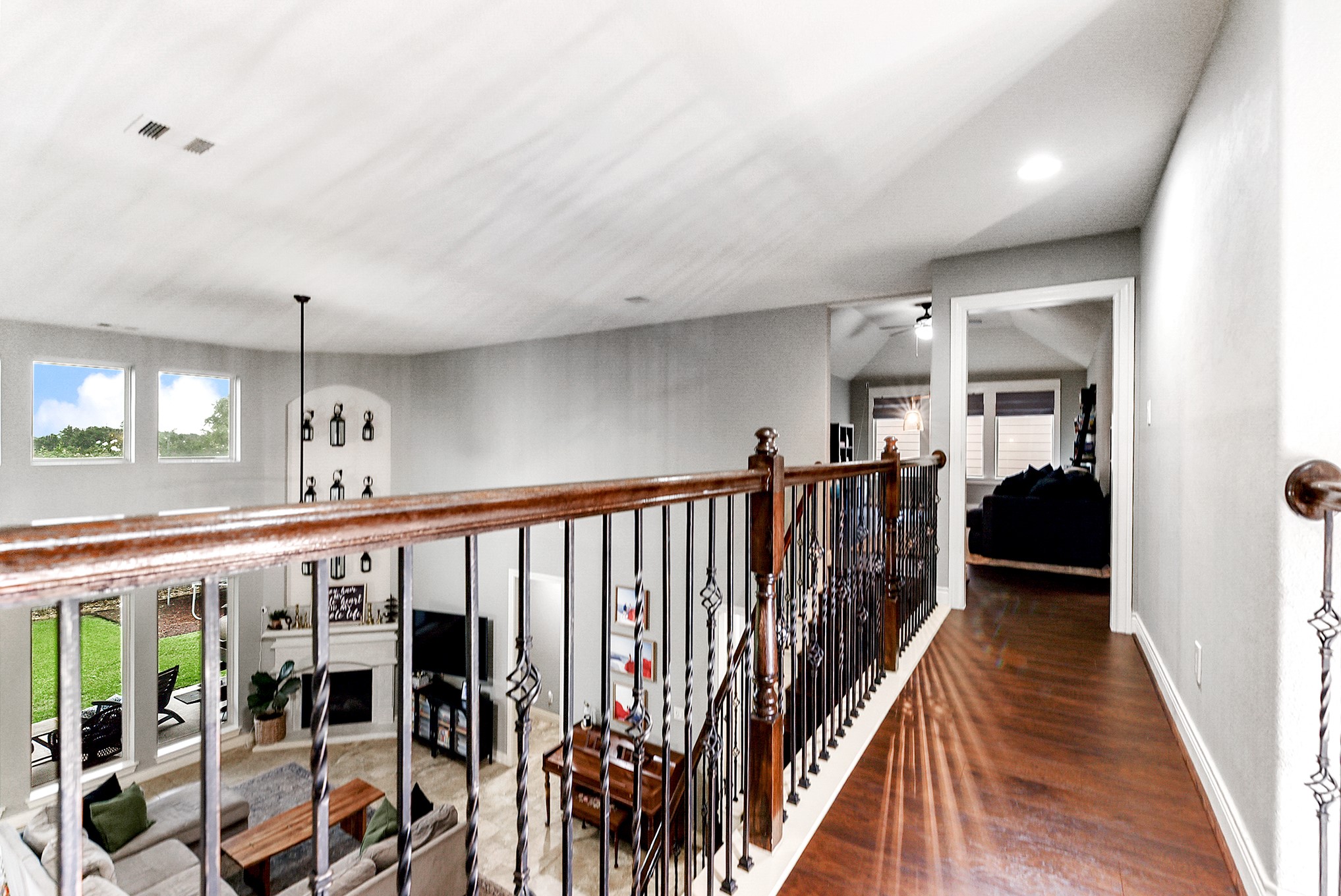 2939 Bobby Jones Road Katy, TX 77494 - Photo 32 of 50 a view of a hallway with wooden floor and windows