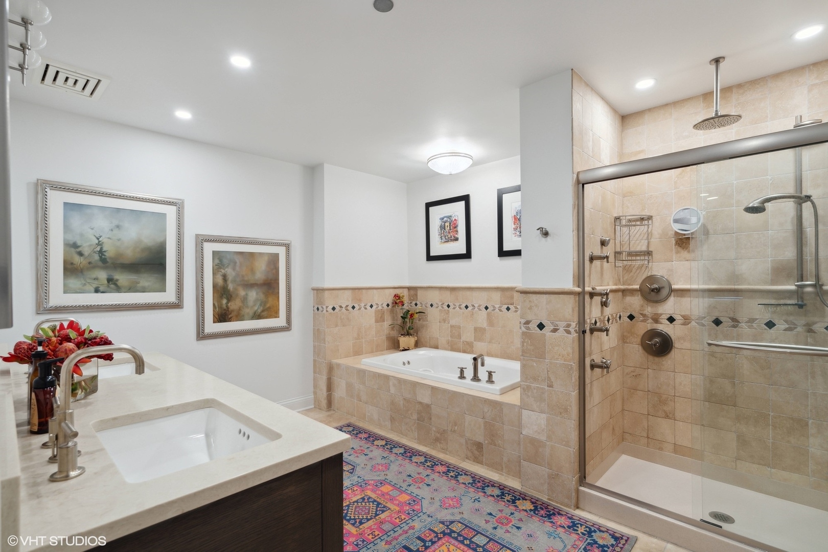 1301 North Dearborn Street, Unit 705 Chicago, IL 60610 - Photo 16 of 25 a bathroom with a tub sink and mirror