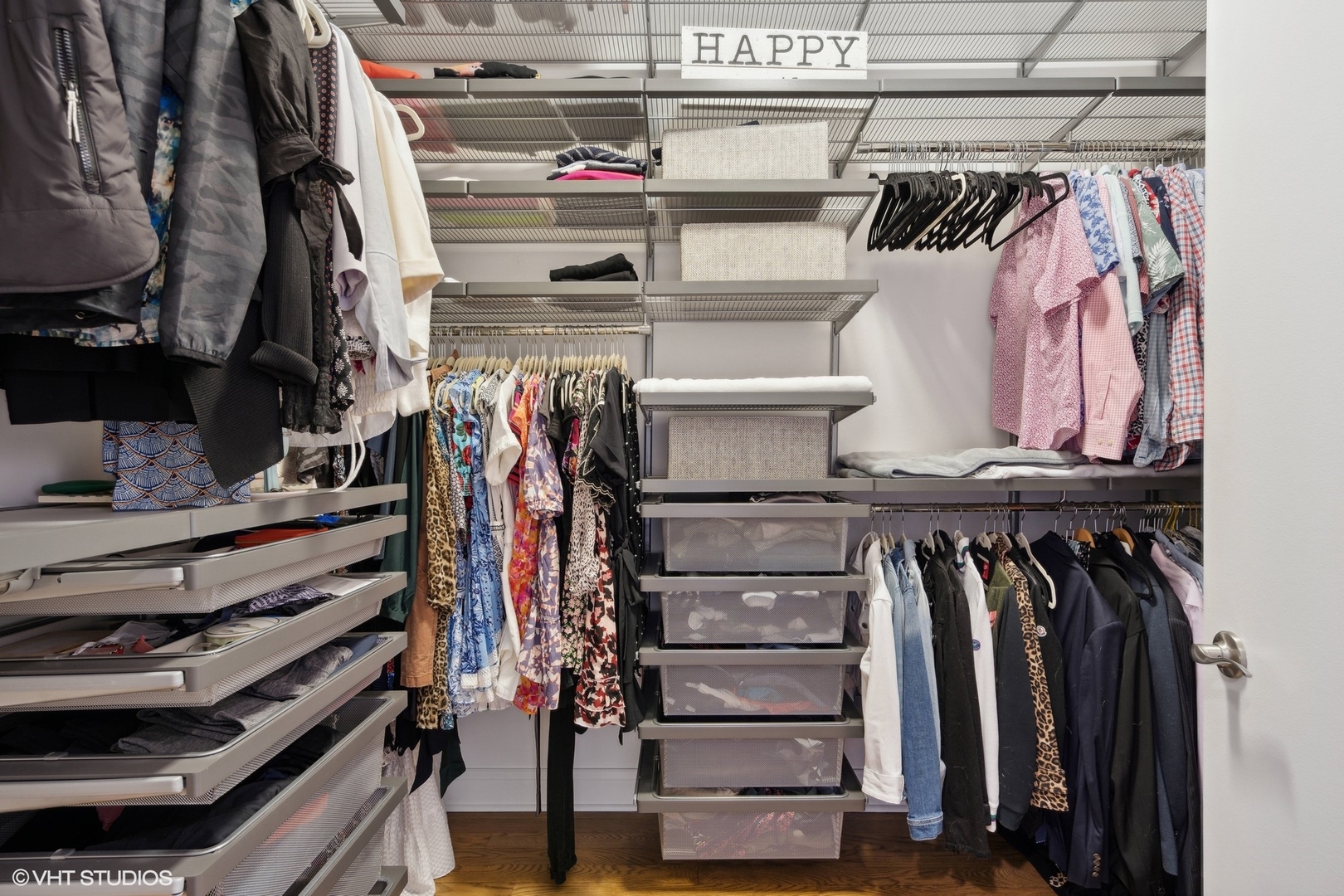 1301 North Dearborn Street, Unit 705 Chicago, IL 60610 - Photo 17 of 25 a view of walk in closet with clothes and shoes