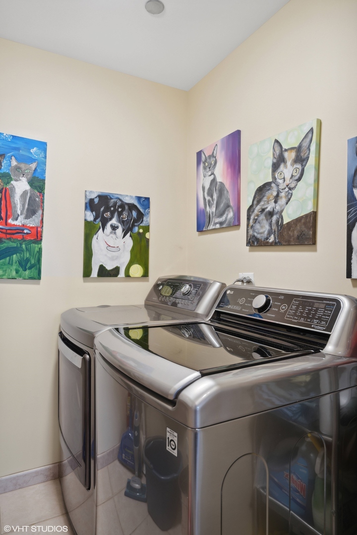 1301 North Dearborn Street, Unit 705 Chicago, IL 60610 - Photo 21 of 25 a utility room with dryer and washer
