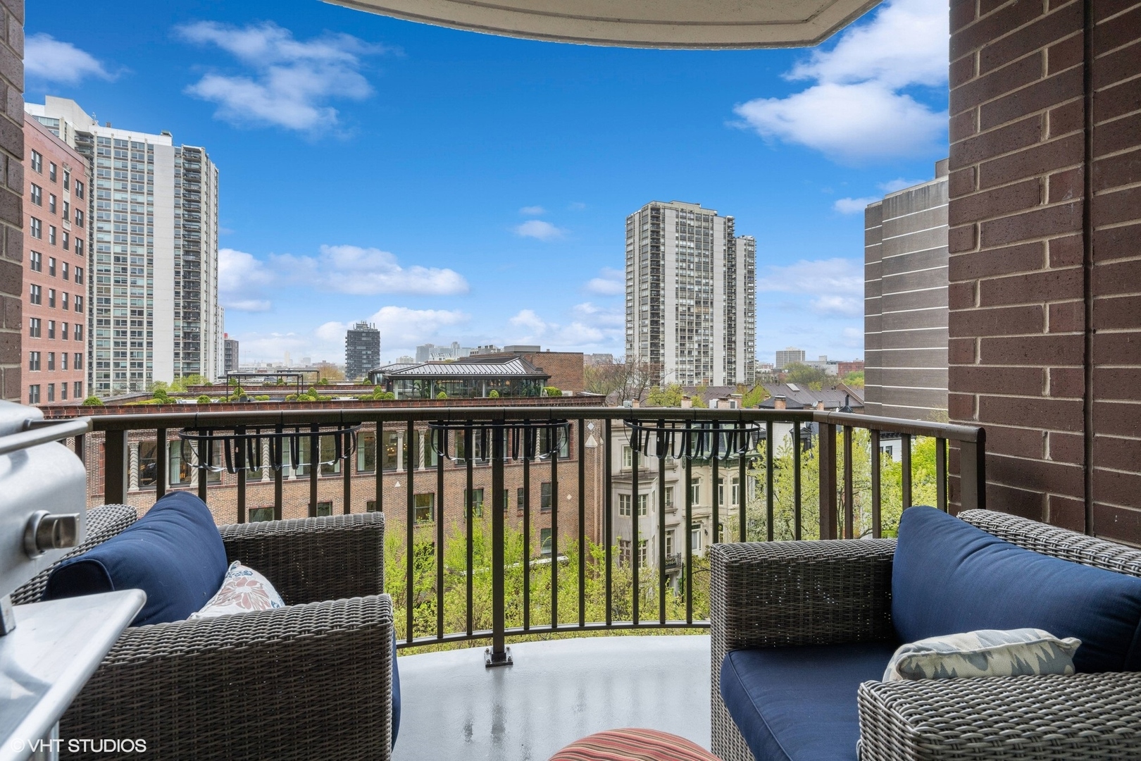 1301 North Dearborn Street, Unit 705 Chicago, IL 60610 - Photo 22 of 25 a balcony with furniture