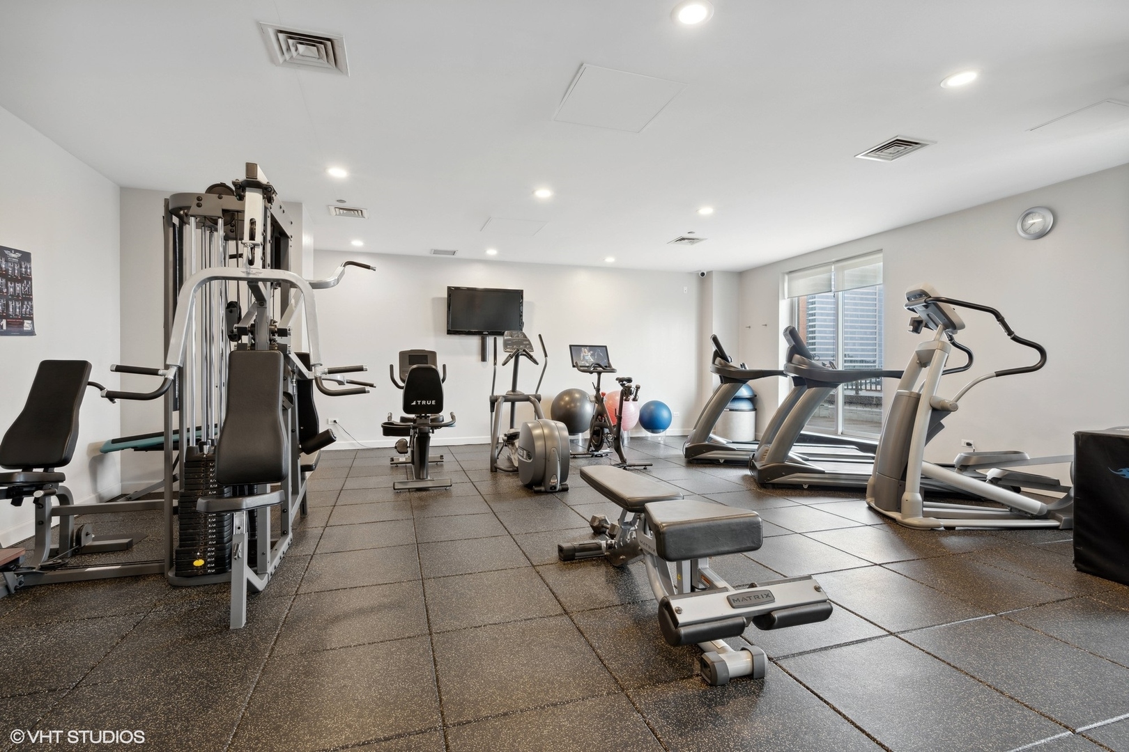 1301 North Dearborn Street, Unit 705 Chicago, IL 60610 - Photo 24 of 25 a view of a room with gym equipment