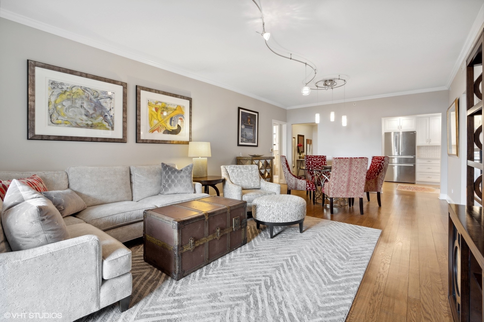 1301 North Dearborn Street, Unit 705 Chicago, IL 60610 - Photo 7 of 25 a living room with couches and painting on the wall