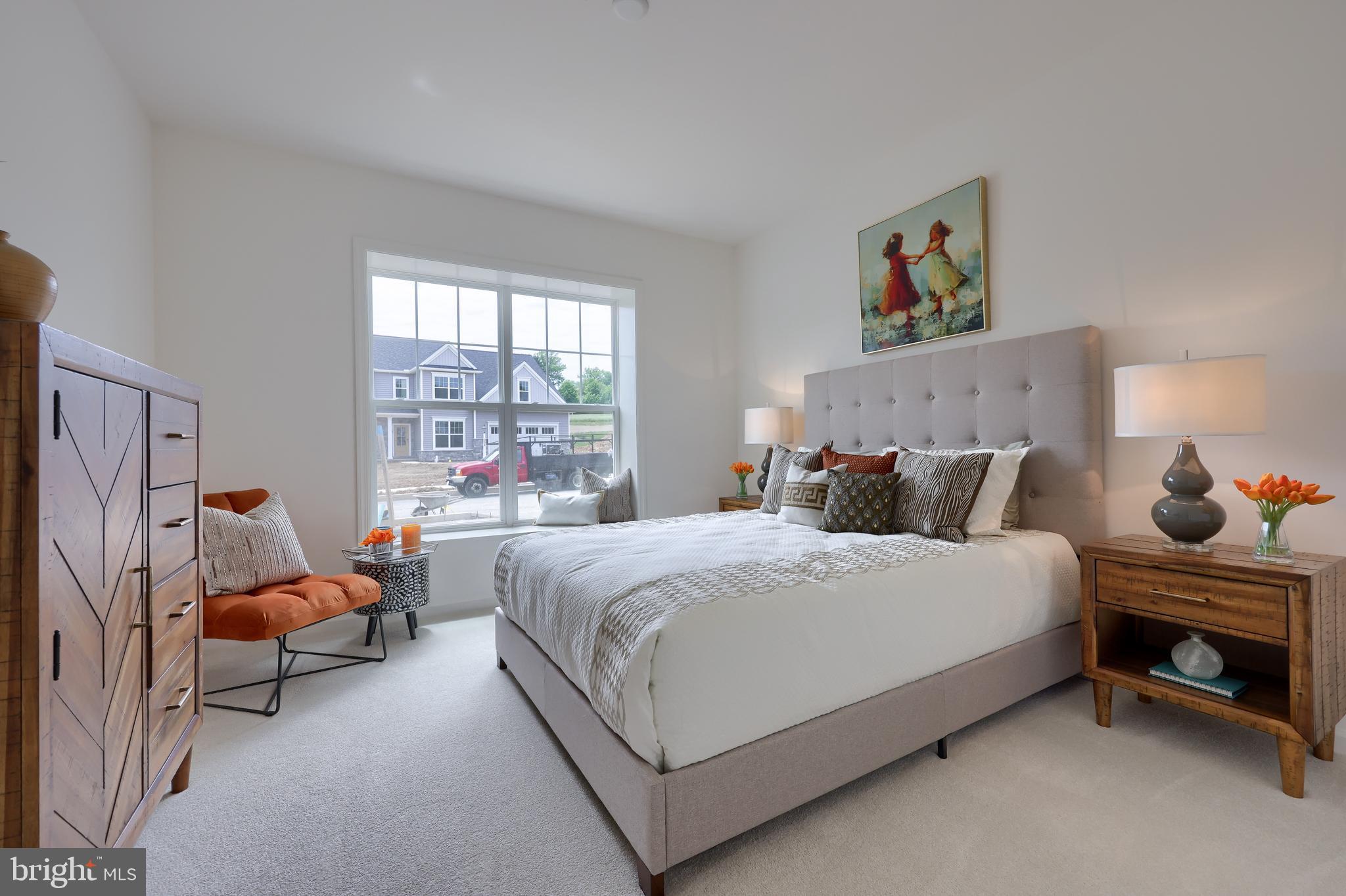 361 Autumn Harvest Lane, Unit 2 Lititz, PA 17543 - Photo 13 of 50 a bedroom with bed and window