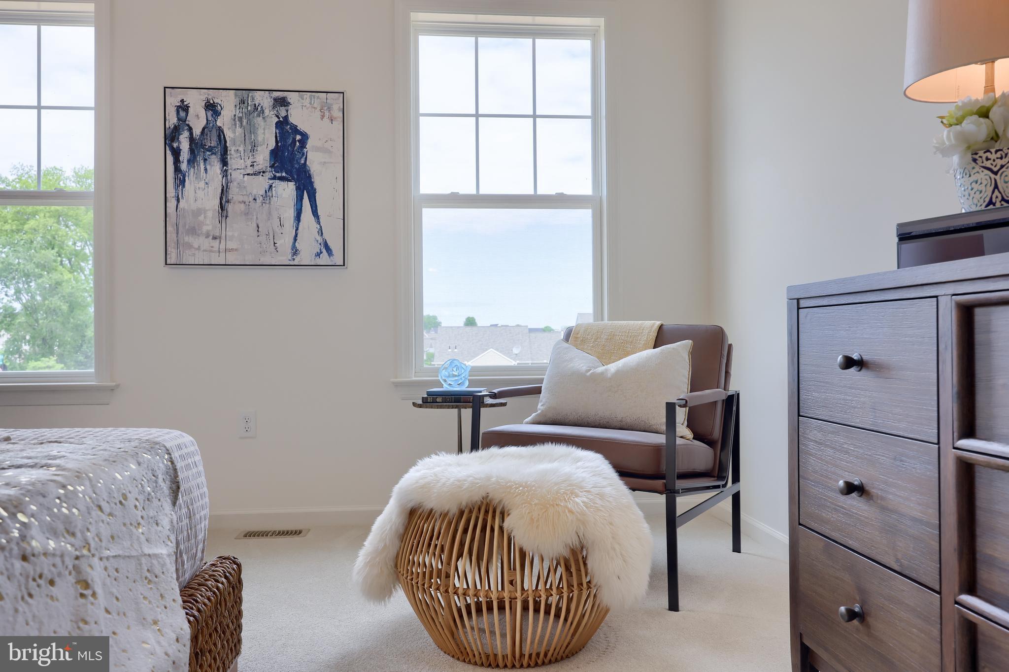 361 Autumn Harvest Lane, Unit 2 Lititz, PA 17543 - Photo 41 of 50 a bedroom with a bed and a painting on the wall