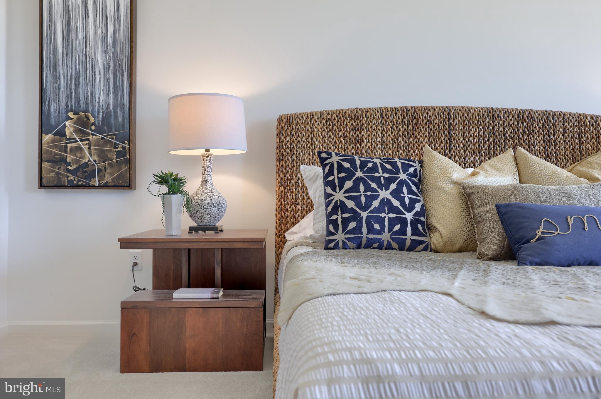 361 Autumn Harvest Lane, Unit 2 Lititz, PA 17543 - Photo 42 of 50 a living room with furniture and a lamp