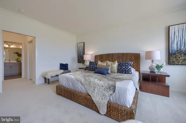 a bathroom with a shower sink and mirror