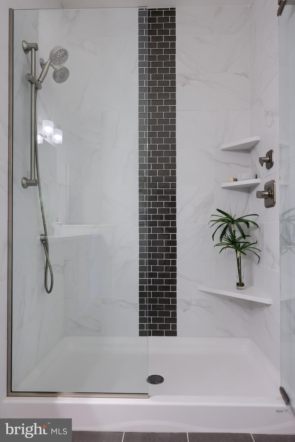 361 Autumn Harvest Lane, Unit 2 Lititz, PA 17543 - Photo 48 of 50 a bathroom with a bathtub and a shower