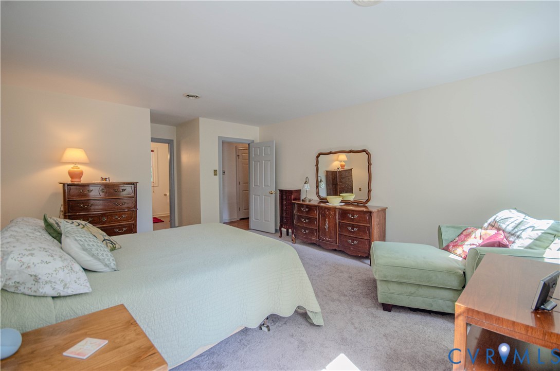 12500 Musical Lane Midlothian, VA 23113 - Photo 21 of 51 Spacious bedroom featuring light-toned walls, neut