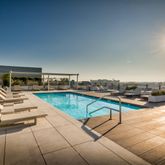 a view of a terrace with chairs