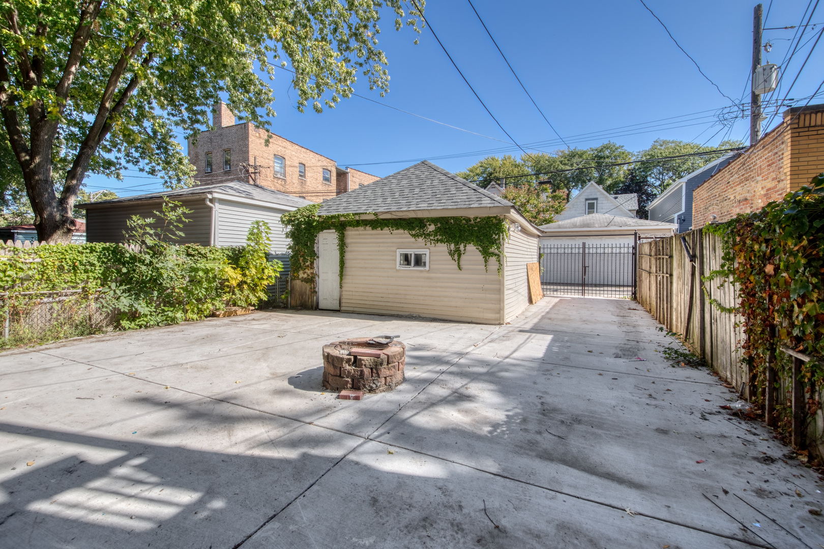 4251 North Lawndale Avenue, Unit 2 Chicago, IL 60618 - Photo 20 of 20 a front view of a house with garden