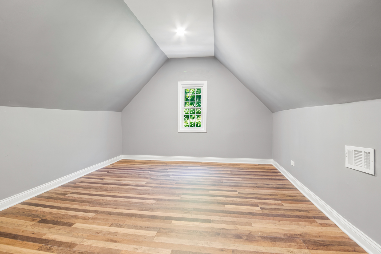 4251 North Lawndale Avenue, Unit 2 Chicago, IL 60618 - Photo 9 of 20 a view of an empty room and window