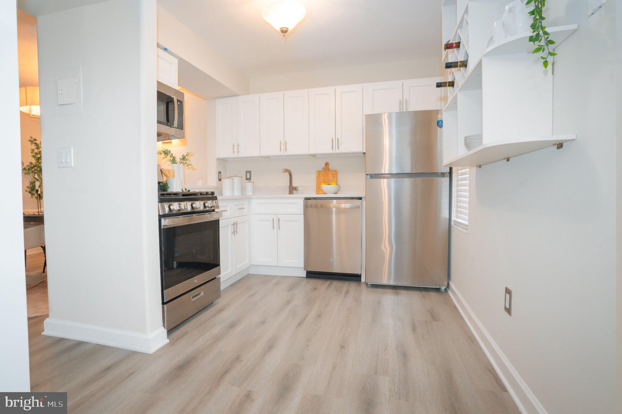 5860 Thunder Hill Road, Unit C1 Columbia, MD 21045 - Photo 9 of 22 Modern kitchen with sleek finishes.