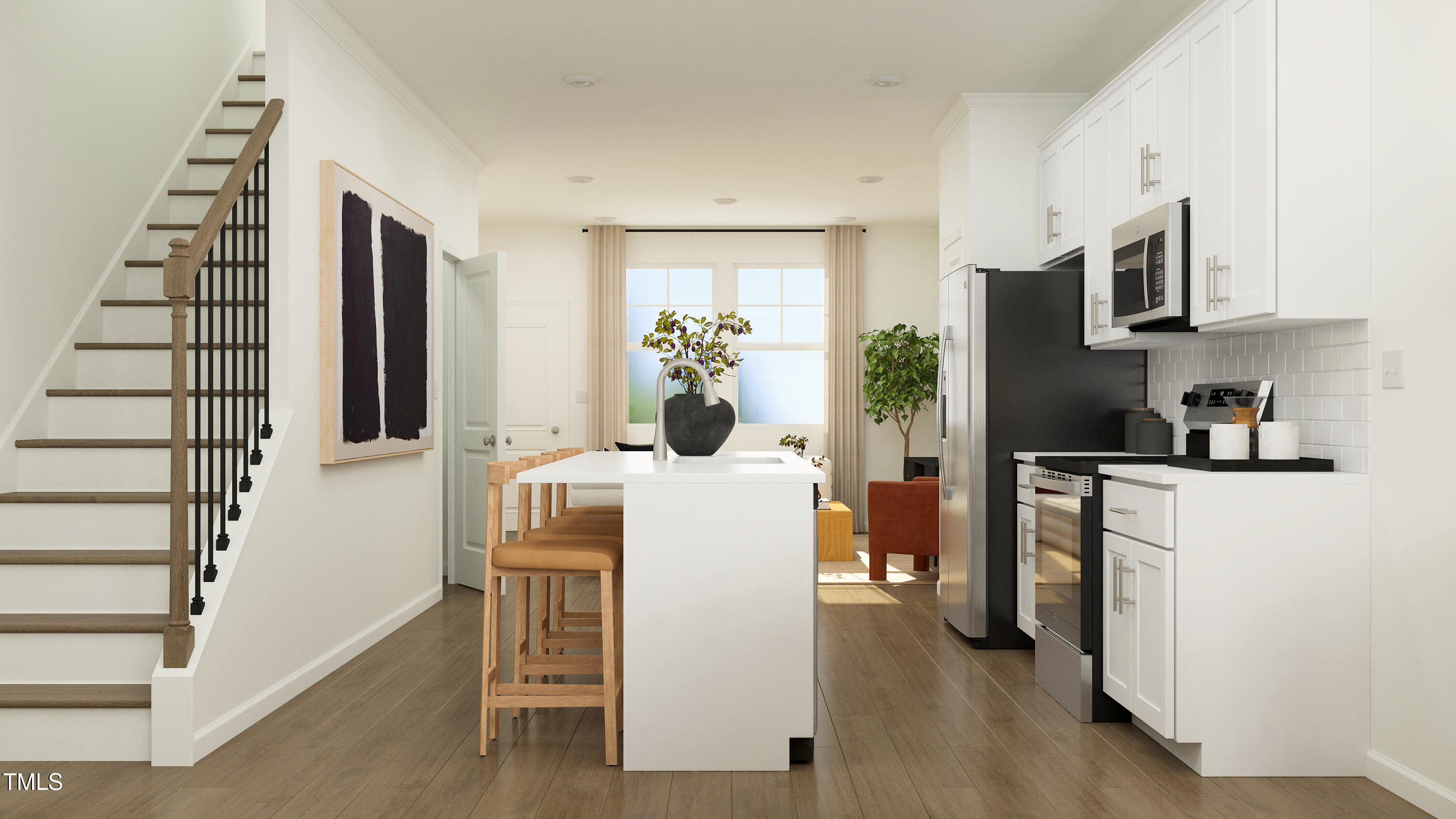 1502 Crescent Townes Way Raleigh, NC 27604 - Photo 16 of 25 a living room with stainless steel appliances kitchen island furniture and wooden floor