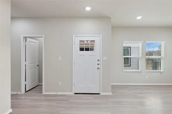 a kitchen with a sink stove and refrigerator