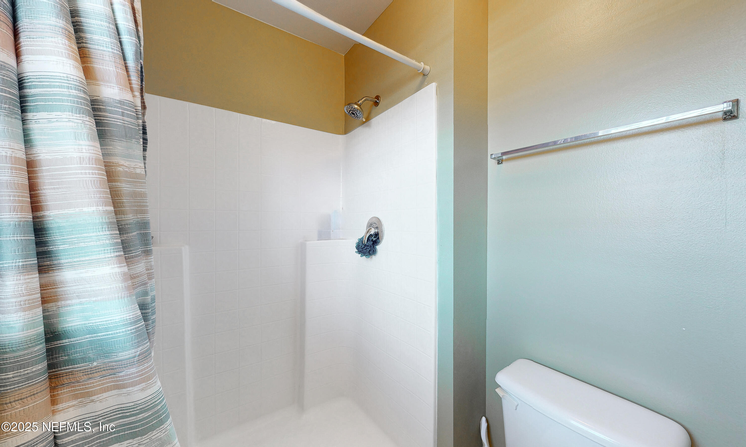 3031 Valkyrie Road Middleburg, FL 32068 - Photo 17 of 36 a bathroom with a shower and toilet