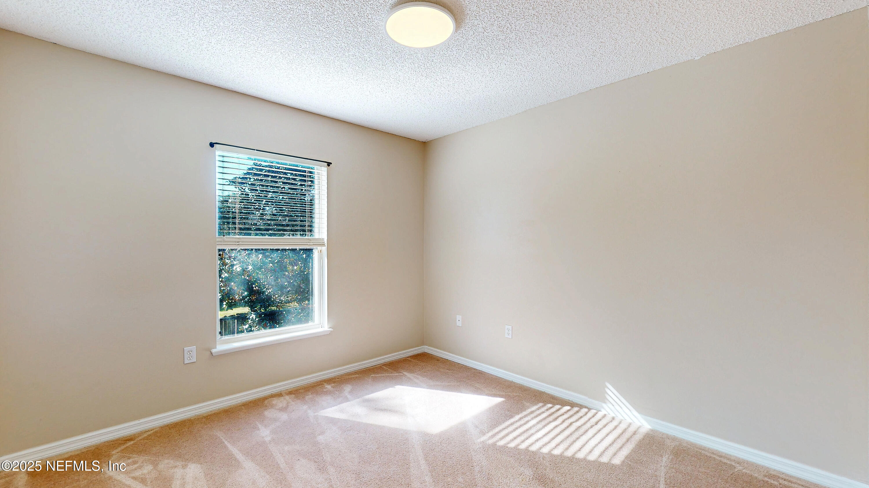 3031 Valkyrie Road Middleburg, FL 32068 - Photo 20 of 36 a view of an empty room with a window