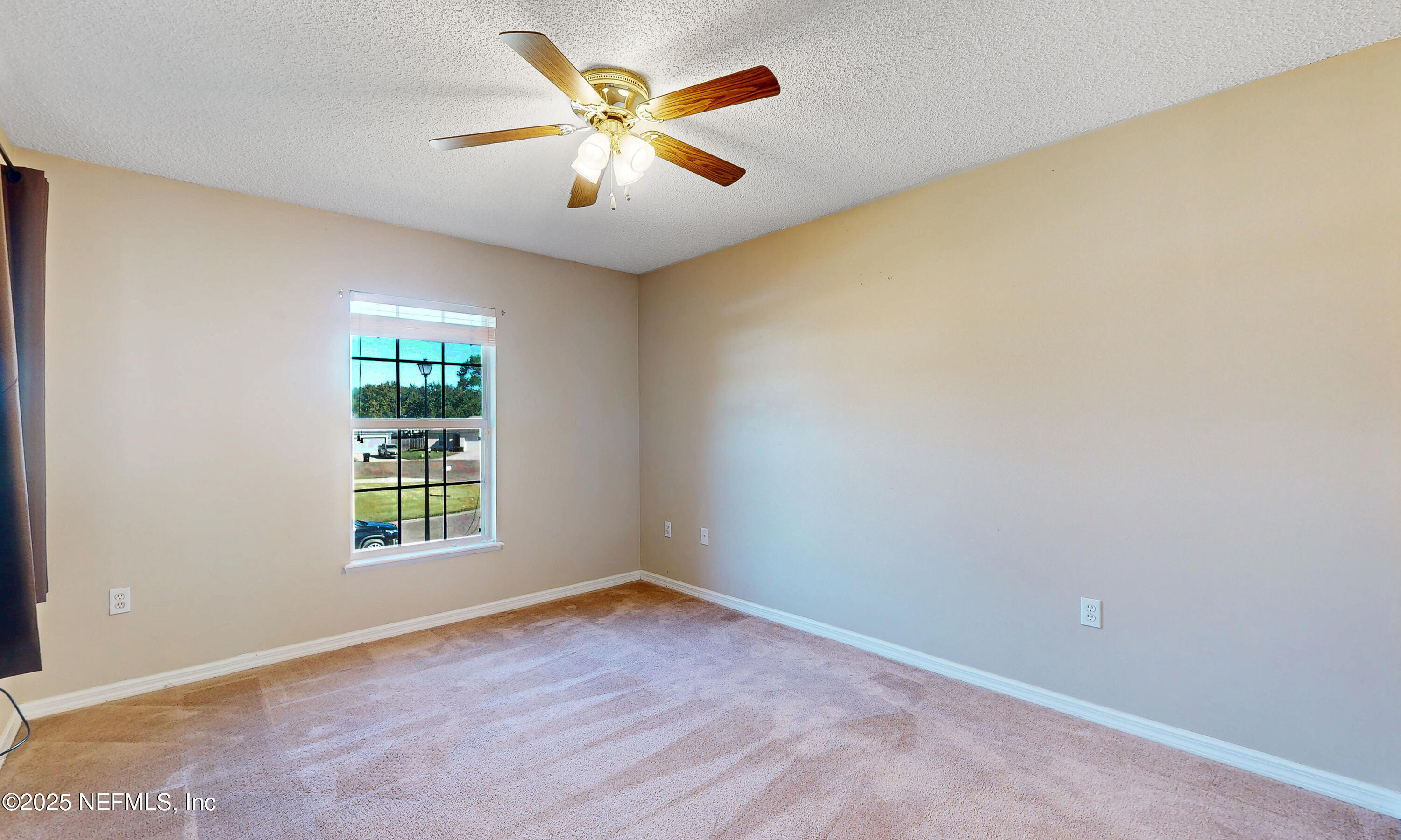3031 Valkyrie Road Middleburg, FL 32068 - Photo 22 of 36 an empty room with a window