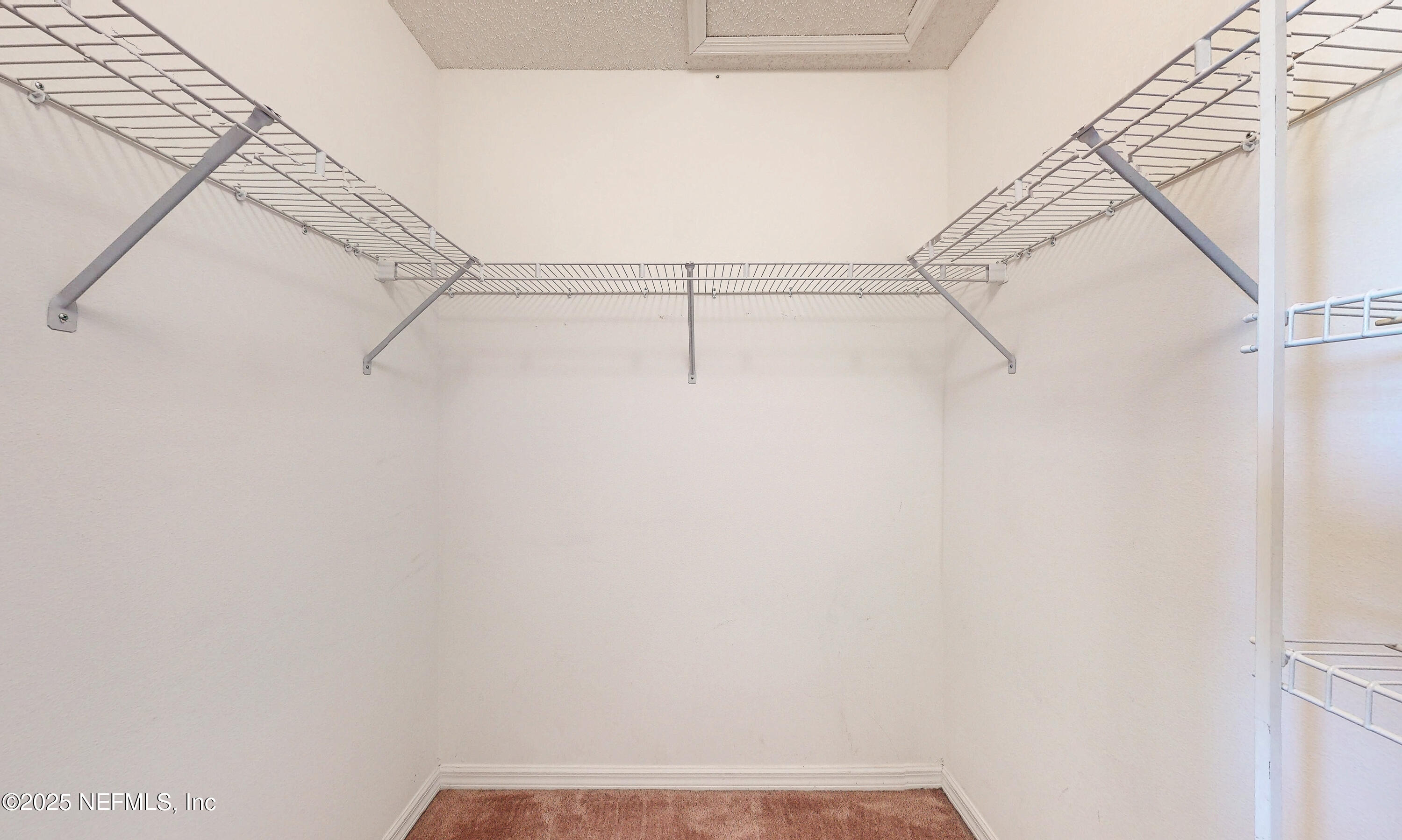 3031 Valkyrie Road Middleburg, FL 32068 - Photo 26 of 36 a view of small space with racks on the wall