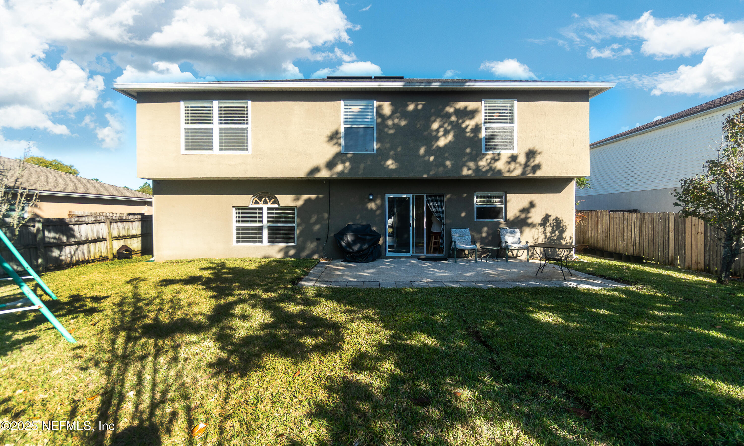 3031 Valkyrie Road Middleburg, FL 32068 - Photo 34 of 36 a view of a house with backyard and sitting area