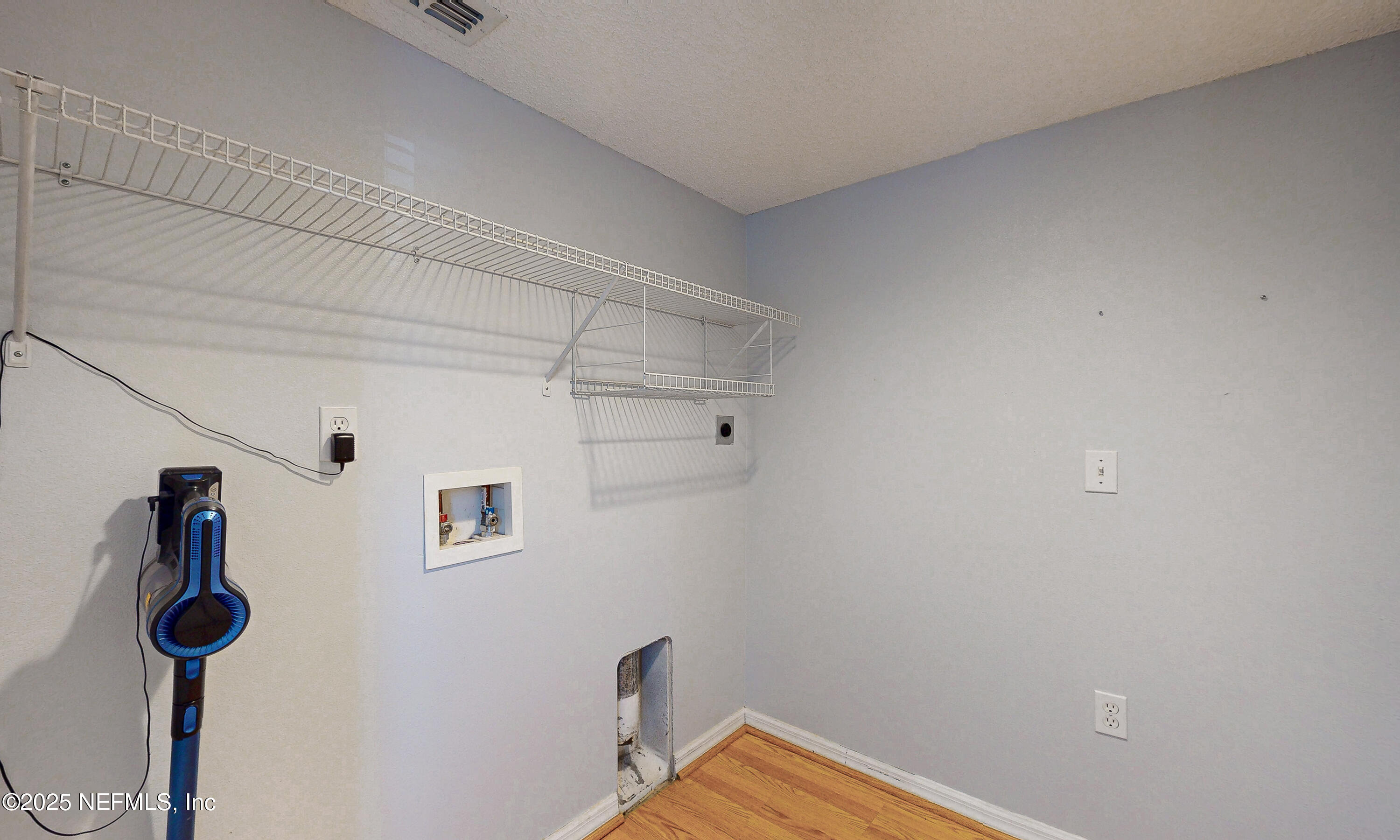 3031 Valkyrie Road Middleburg, FL 32068 - Photo 35 of 36 a view of a storage & utility room with dryer and washer