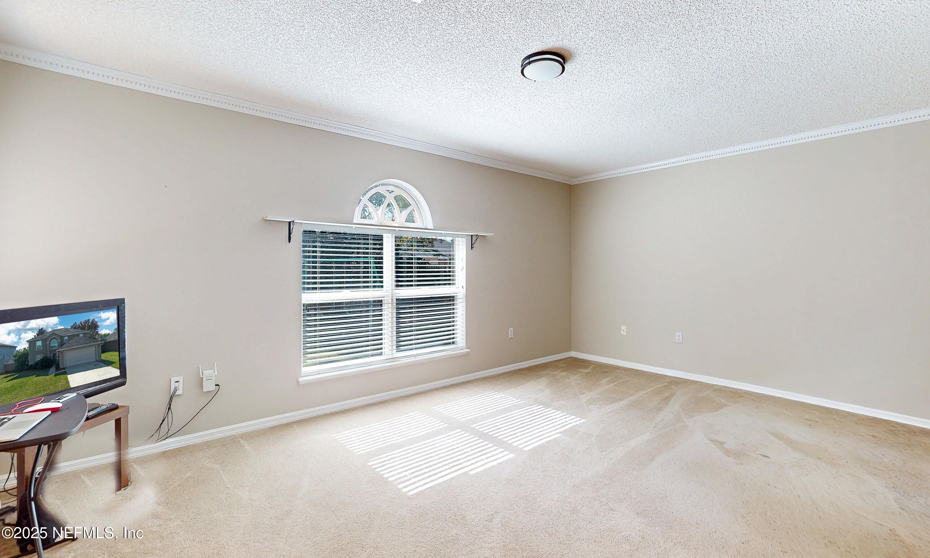 3031 Valkyrie Road Middleburg, FL 32068 - Photo 9 of 36 a view of an empty room with a window