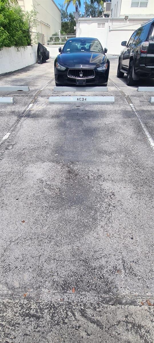 1300 Alton Road, Unit 3D Miami Beach, FL 33139 - Photo 10 of 11 a view of street with parked cars