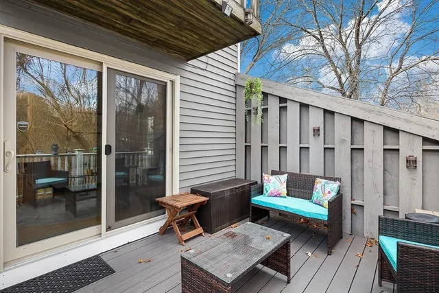 a blue bench sitting in front of a house