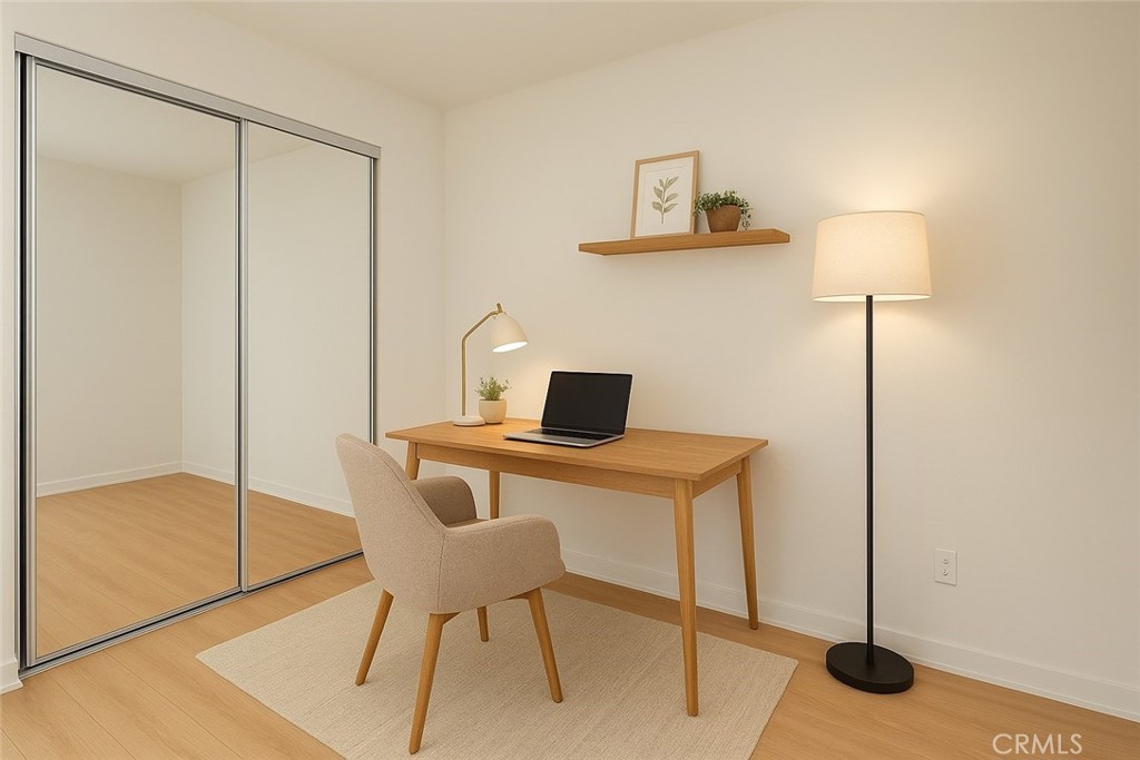 3810 Wilshire Boulevard, Unit 1409 Los Angeles, CA 90010 - Photo 11 of 41 a workspace with furniture and window