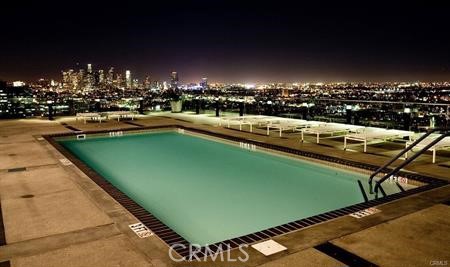 3810 Wilshire Boulevard, Unit 1409 Los Angeles, CA 90010 - Photo 28 of 41 a view of a swimming pool and outdoor seating