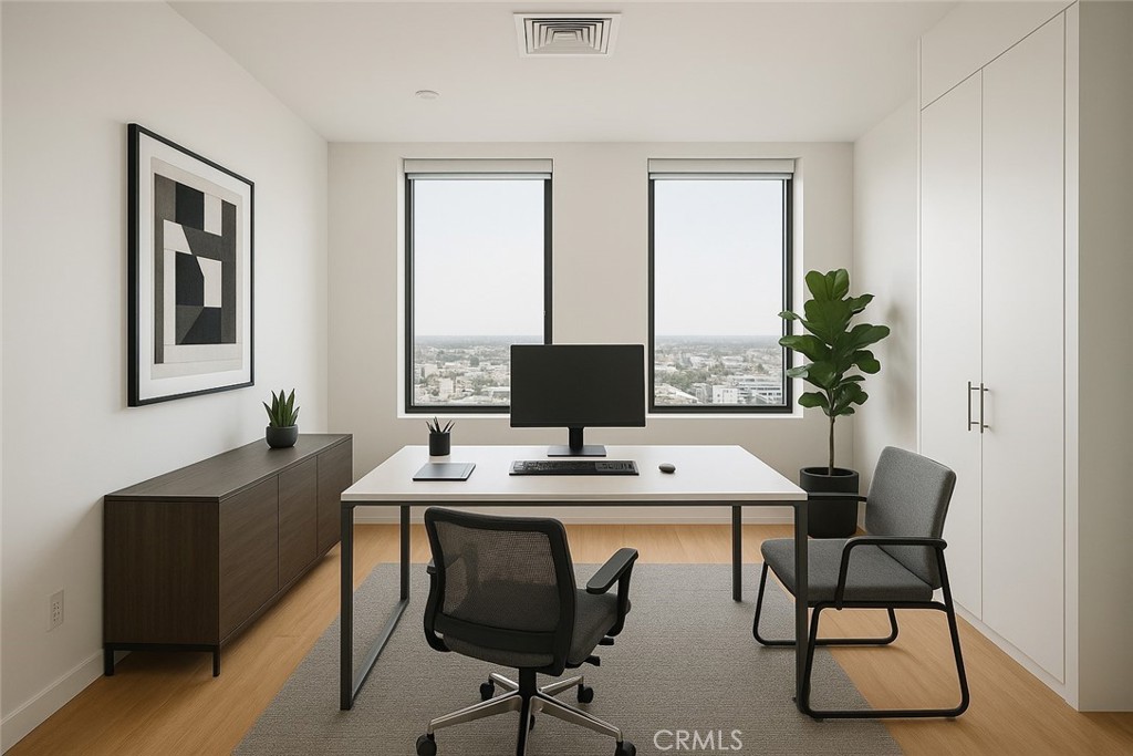 3810 Wilshire Boulevard, Unit 1409 Los Angeles, CA 90010 - Photo 3 of 41 a dining room with furniture and window