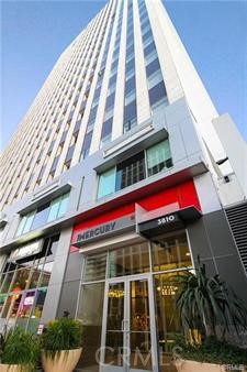 3810 Wilshire Boulevard, Unit 1409 Los Angeles, CA 90010 - Photo 5 of 41 a building with multiple windows