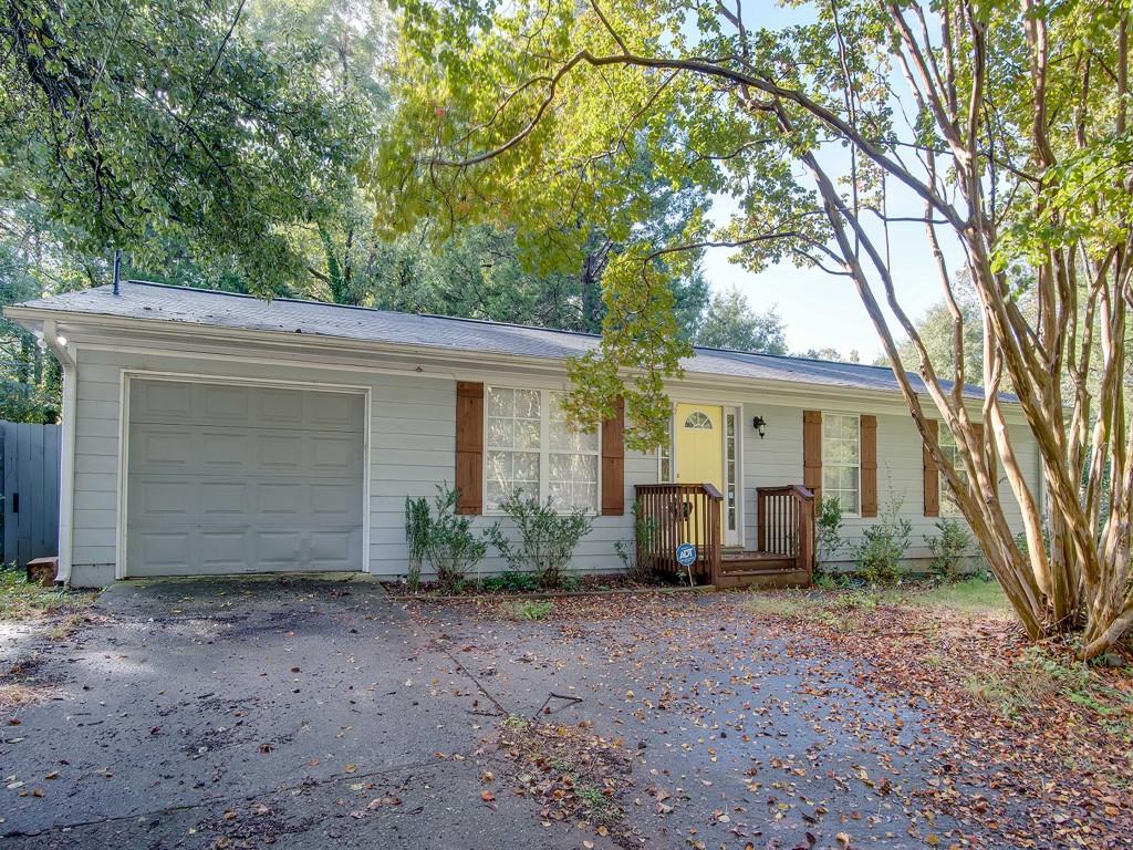 1633 Liberty Valley Decatur, GA 30032 - Photo 1 of 1 a view of a house with backyard and garden
